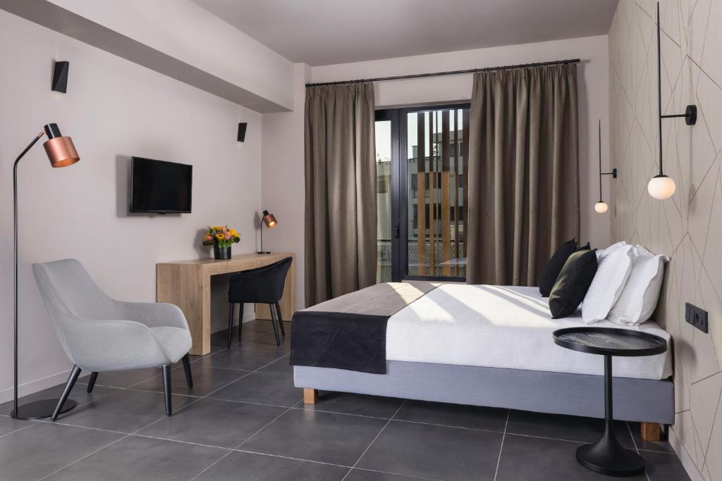Televízia a/alebo spoločenská miestnosť v ubytovaní Azur Suites
