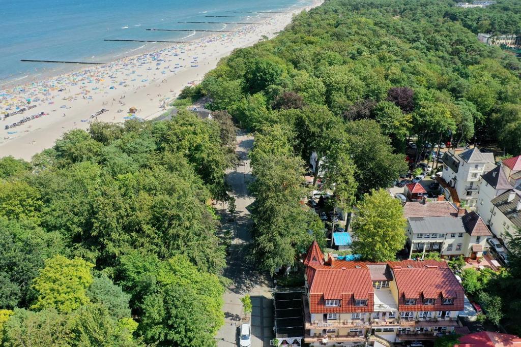 an aerial view of a beach with a crowd of people at Fregata in Ustka