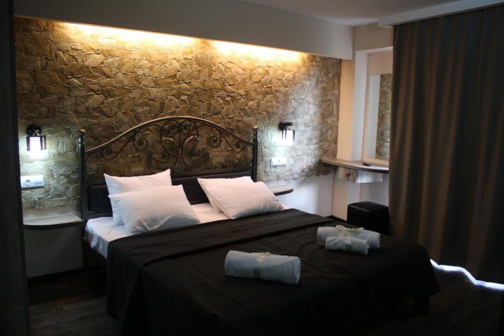 Postel nebo postele na pokoji v ubytování Hotel Delisi