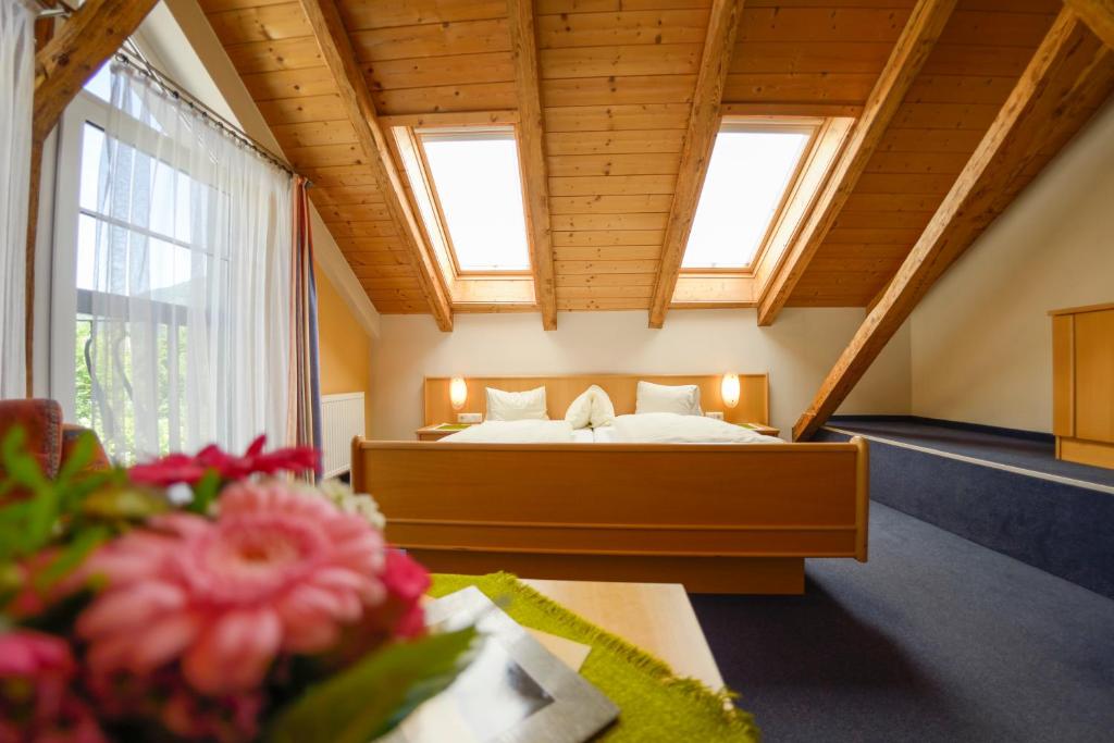 Posteľ alebo postele v izbe v ubytovaní Hotel Flattacher Hof