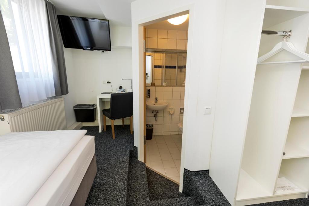 TV a/nebo společenská místnost v ubytování mk hotel eschborn
