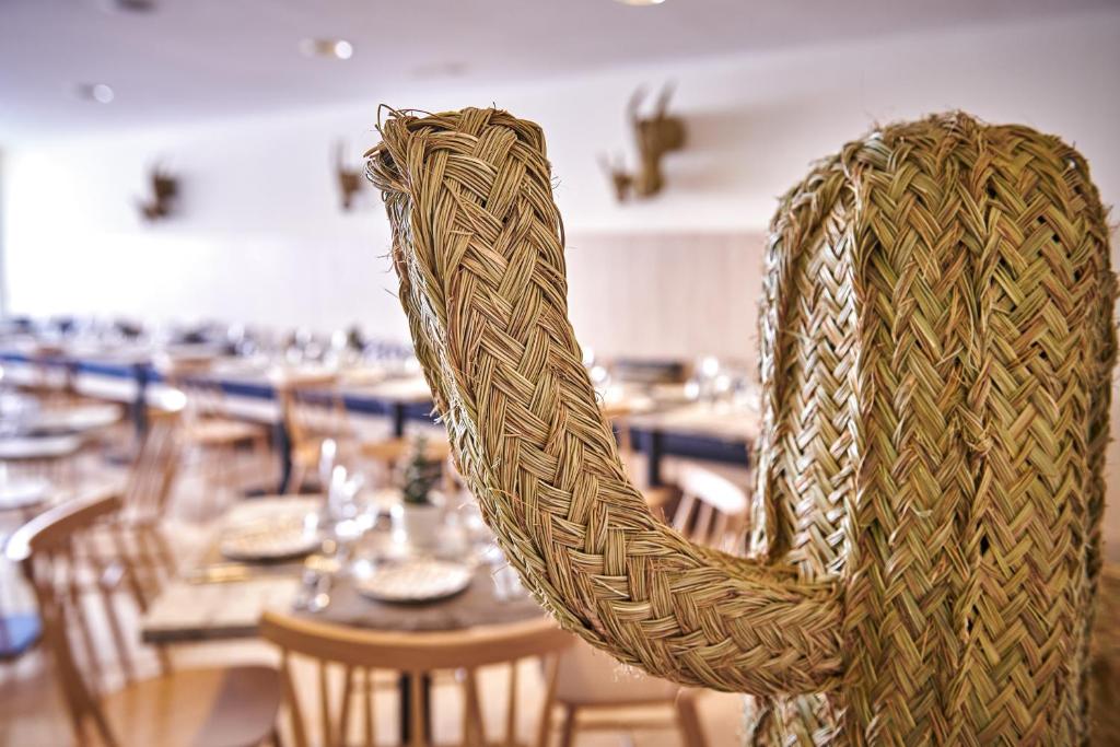 Reštaurácia alebo iné gastronomické zariadenie v ubytovaní Hipotels Coma Gran