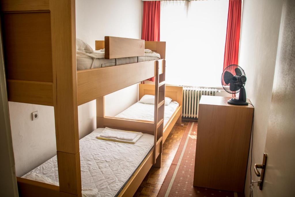 Postel nebo postele na pokoji v ubytování HI Hostel Zagreb