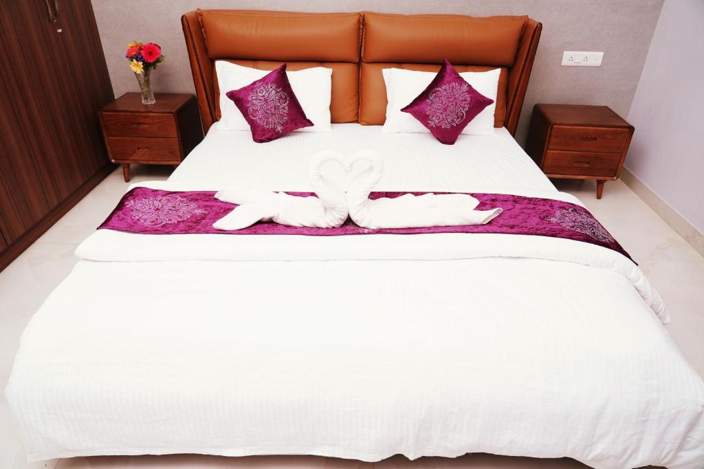 UNNATHI SUITES - 