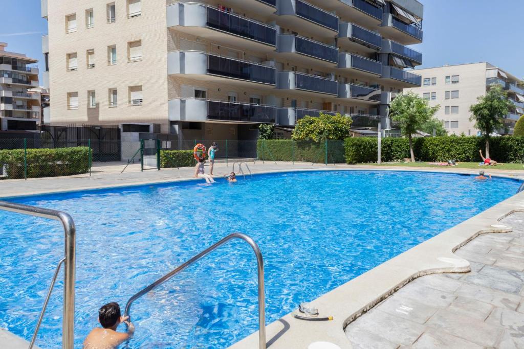 Bazén v ubytovaní Homes&Go Nova Pineda Alto alebo v jeho blízkosti