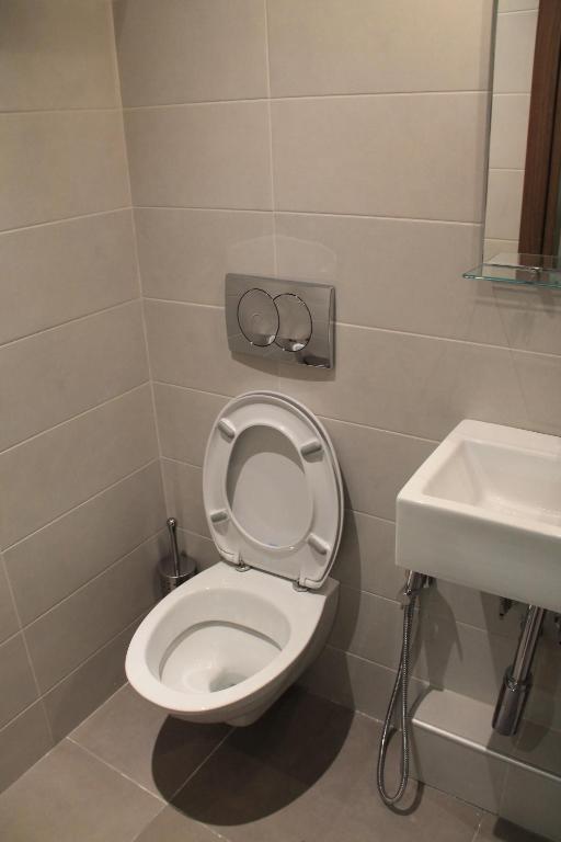A bathroom at Studio City Center