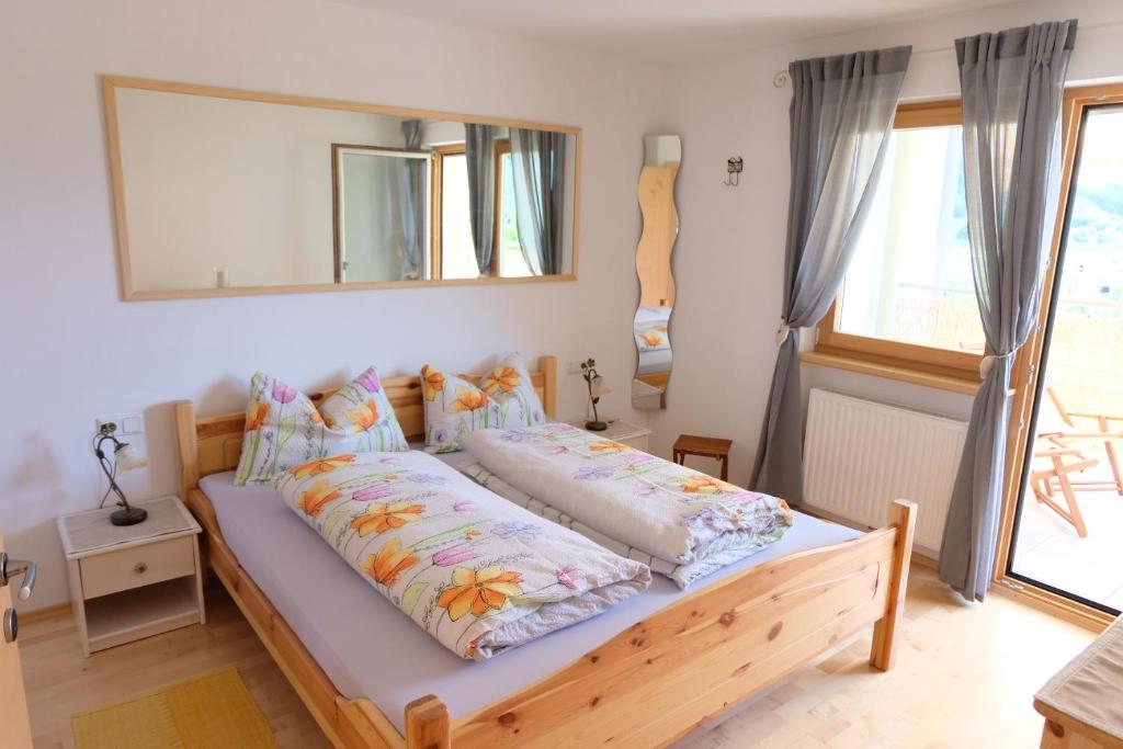 Posteľ alebo postele v izbe v ubytovaní Ferienwohnungen Villa Mirabilis