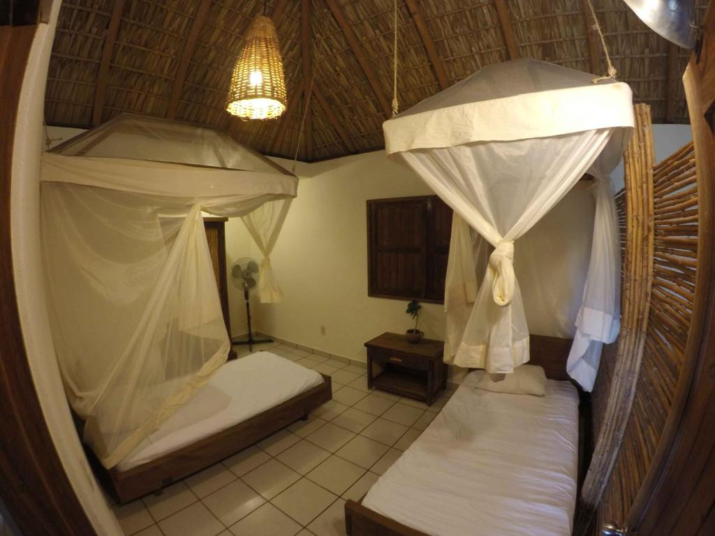 Letto o letti in una camera di Casa Aditi