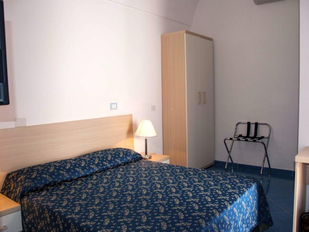 Postel nebo postele na pokoji v ubytování B&B La Terrazza Sul Porto