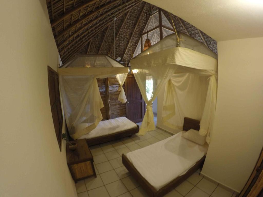 Letto o letti in una camera di Casa Aditi