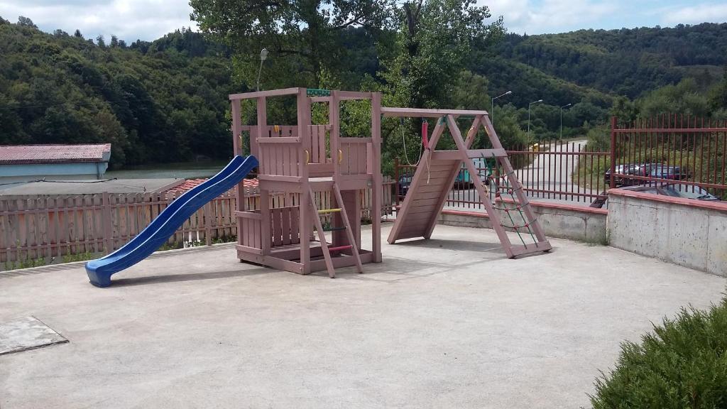 a playground with a slide at Apartment Lake Tryavna in Tryavna