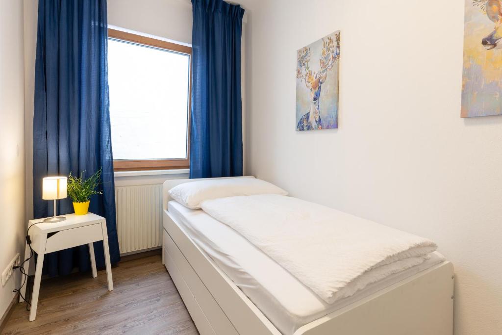 Postel nebo postele na pokoji v ubytování atrium untergrafendorf