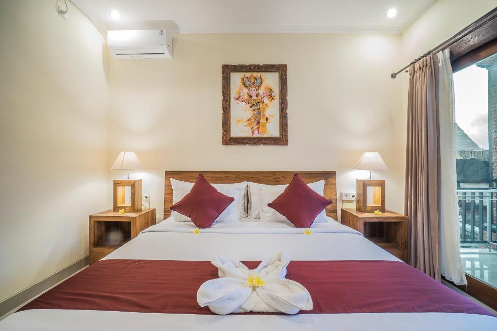 Postel nebo postele na pokoji v ubytování Sriwedari 40 Ubud