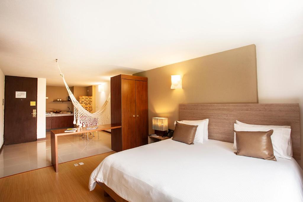 Łóżko lub łóżka w pokoju w obiekcie Viaggio Urbano Business