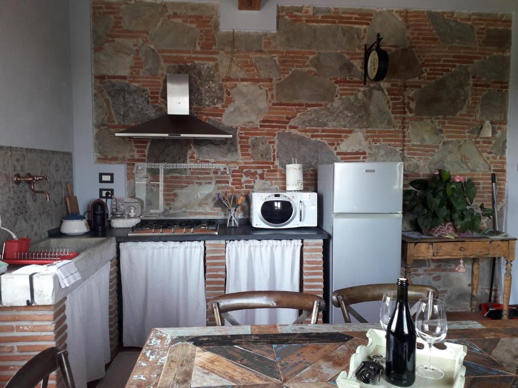 Kuchyň nebo kuchyňský kout v ubytování Casa De Servi