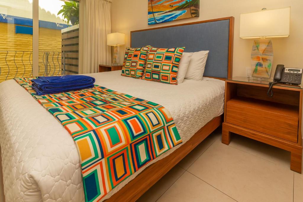 Postel nebo postele na pokoji v ubytování V Azul Vallarta - Luxury Vacation Rental Adults Only
