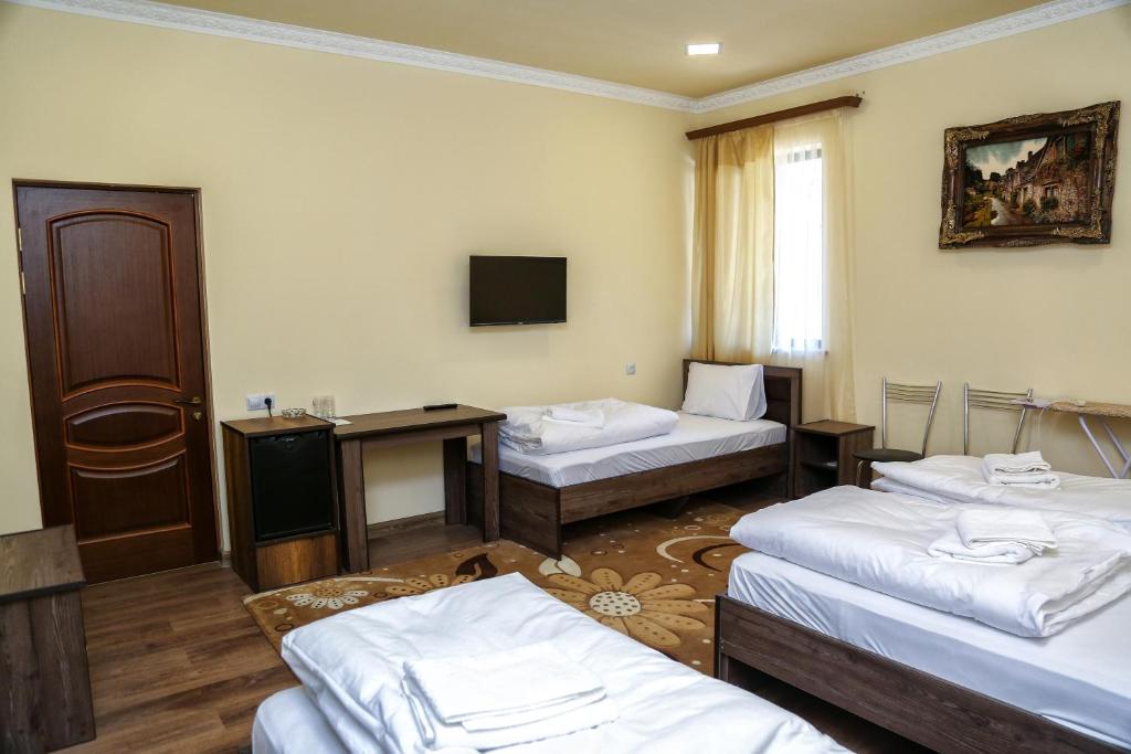 Postel nebo postele na pokoji v ubytování Sofya