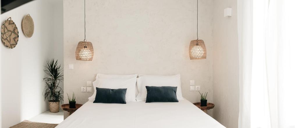Postel nebo postele na pokoji v ubytování BOĒM Boutique Hotel Lefkada