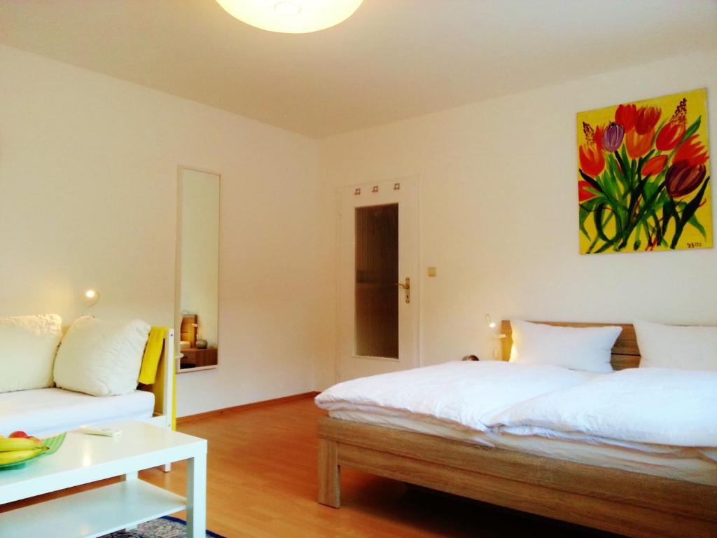 Postel nebo postele na pokoji v ubytování Altstadt-Süd - CGN Apartments