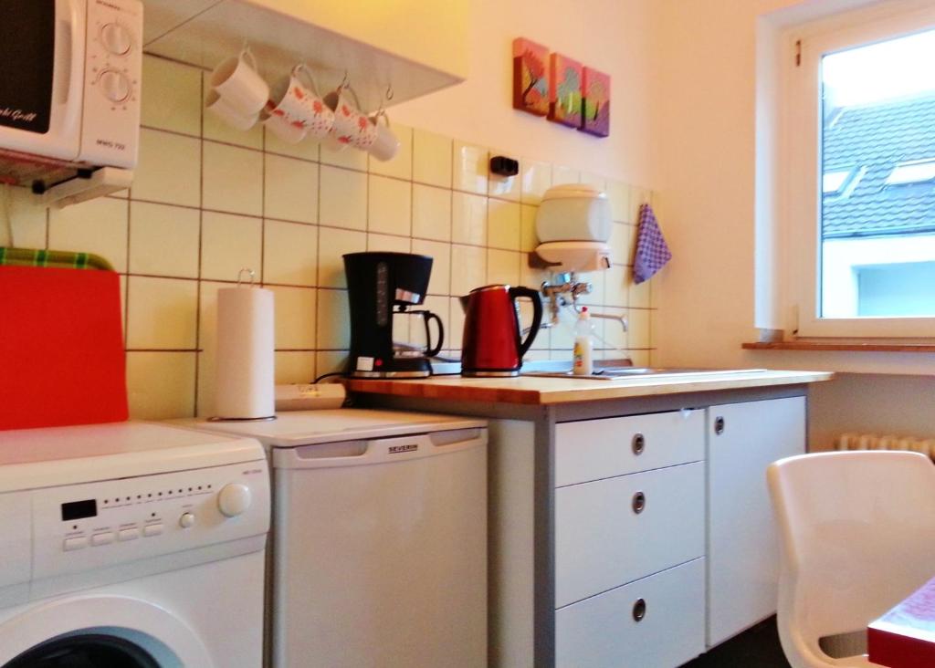 Kuchyň nebo kuchyňský kout v ubytování Altstadt-Süd - CGN Apartments