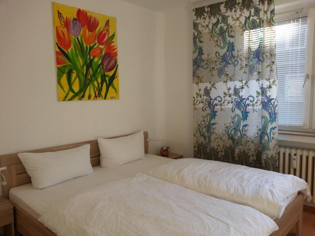 Postel nebo postele na pokoji v ubytování Altstadt-Süd - CGN Apartments