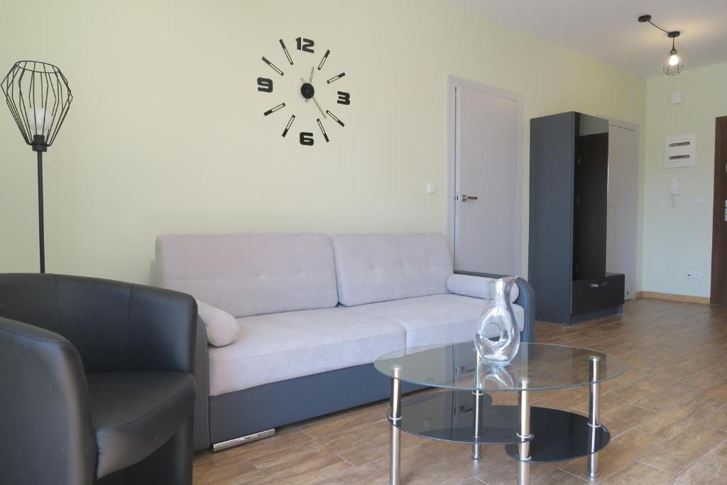 Posedenie v ubytovaní LuxApartament 1 - z widokiem i garażem w nowym Zeta Park