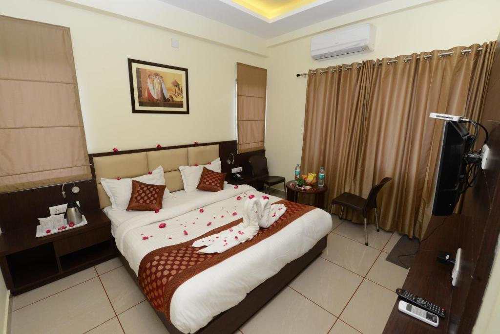 Postelja oz. postelje v sobi nastanitve Hotel Sanobar