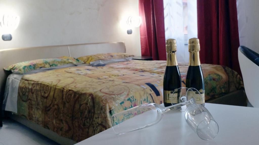 Posteľ alebo postele v izbe v ubytovaní National Gallery Taormina B&B
