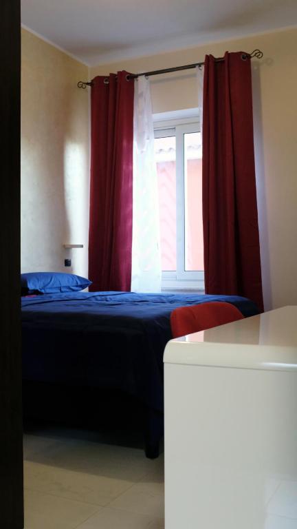 Posteľ alebo postele v izbe v ubytovaní National Gallery Taormina B&B