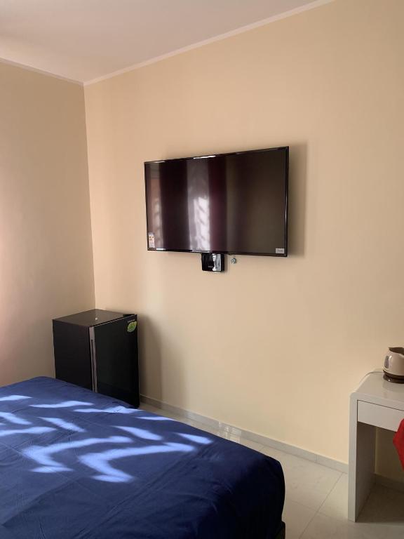 Televízia a/alebo spoločenská miestnosť v ubytovaní National Gallery Taormina B&B