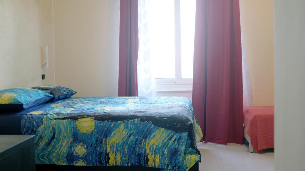 Posteľ alebo postele v izbe v ubytovaní National Gallery Taormina B&B