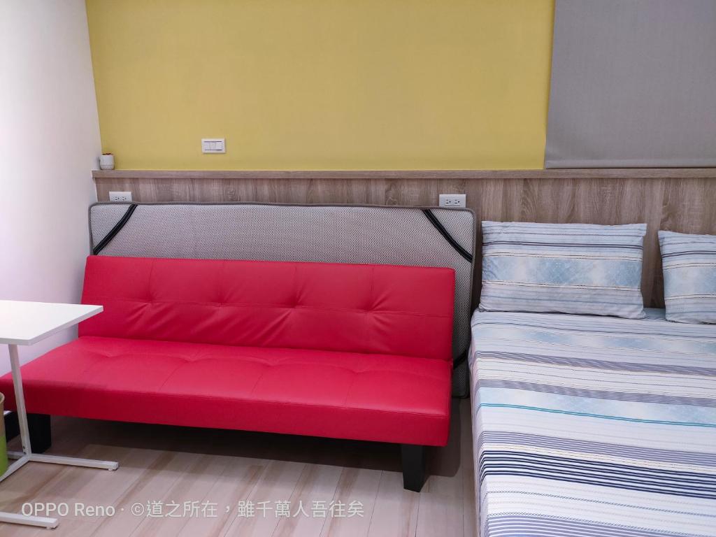 Postel nebo postele na pokoji v ubytování 禾心居He Xin Ju Homestay
