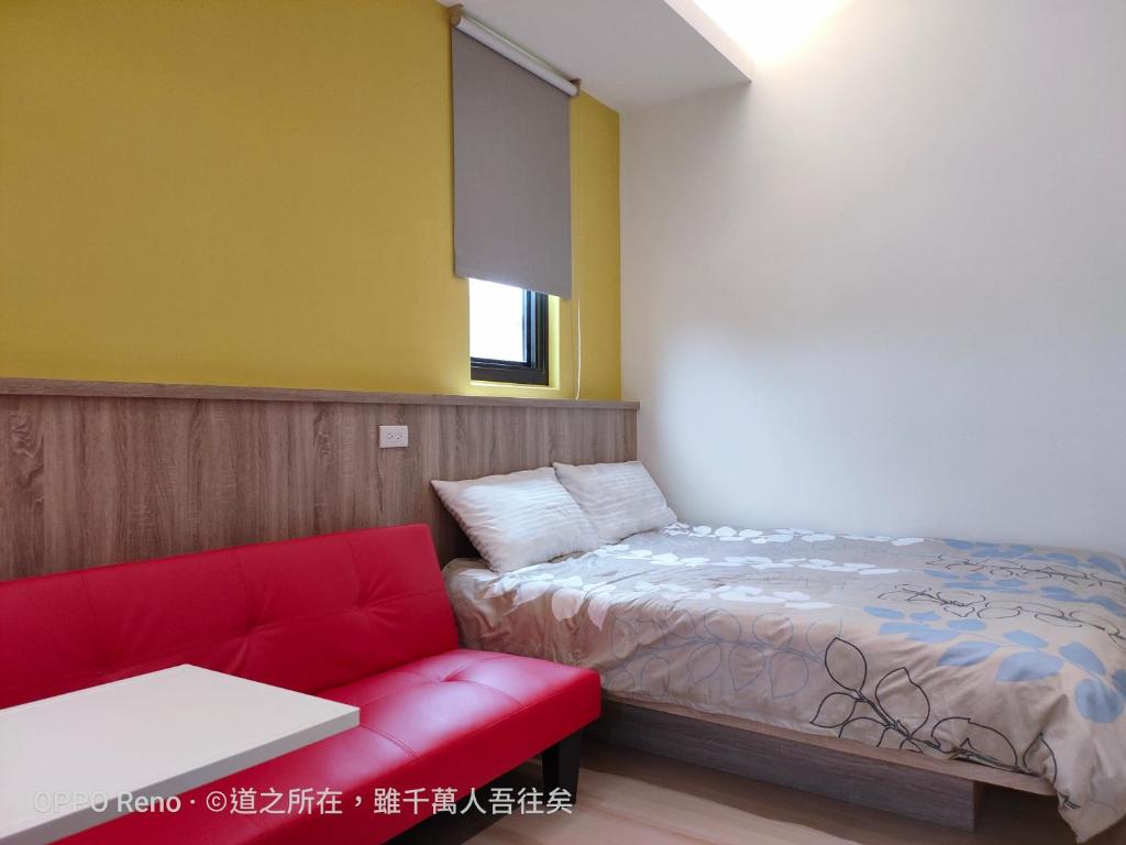 Postel nebo postele na pokoji v ubytování 禾心居He Xin Ju Homestay