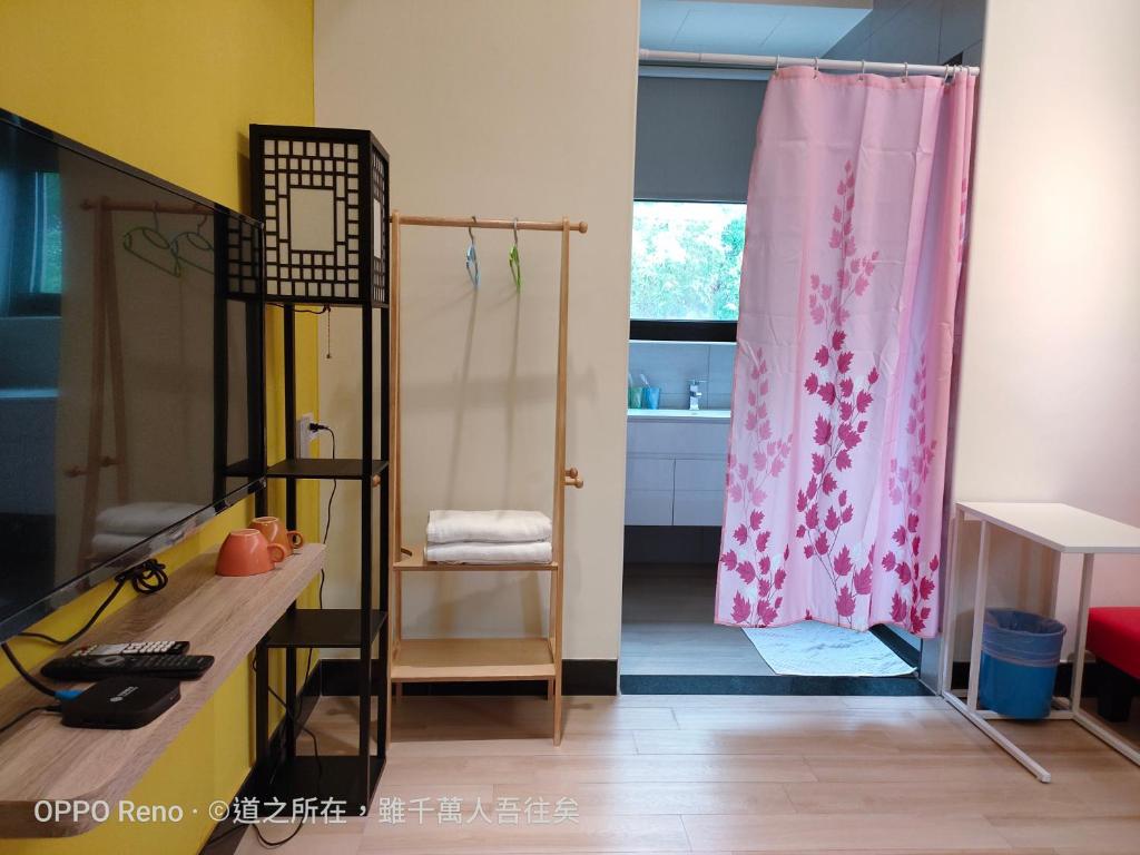 Postel nebo postele na pokoji v ubytování 禾心居He Xin Ju Homestay
