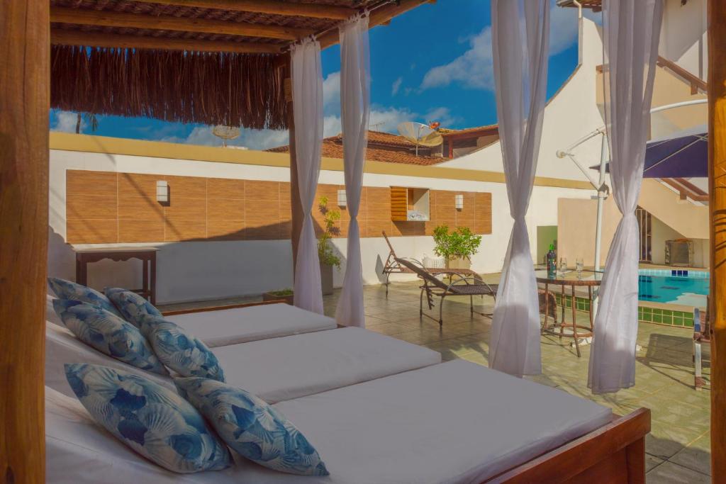 Bazén v ubytování Pousada Lua e Mar nebo v jeho okolí
