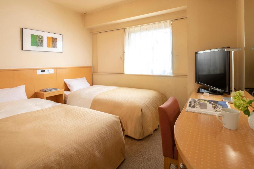 TV a/nebo společenská místnost v ubytování Chisun Hotel Hamamatsucho