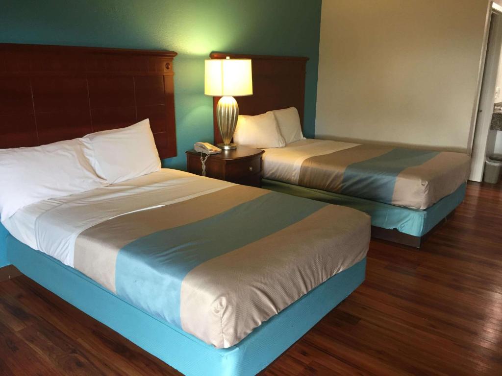 Ένα ή περισσότερα κρεβάτια σε δωμάτιο στο Motel 6-Nashville, TN - Airport