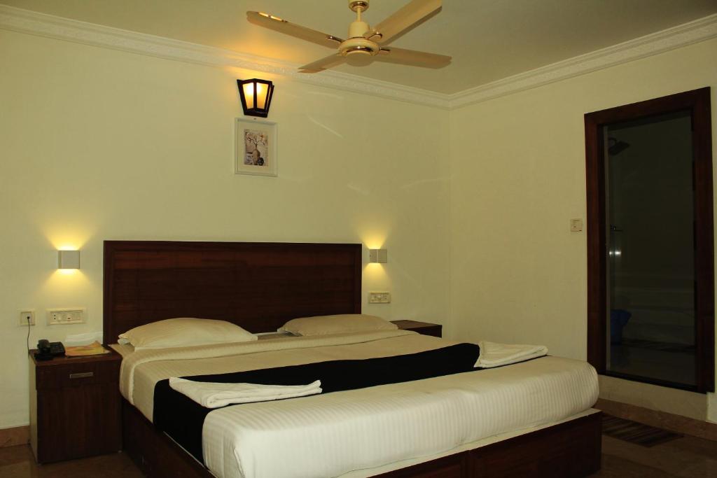 Postel nebo postele na pokoji v ubytování Bellavista Resort Munnar