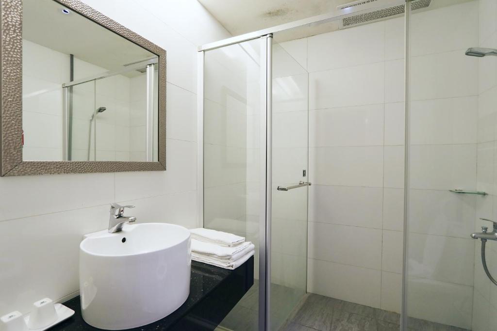 Koupelna v ubytování Chao She Hotel