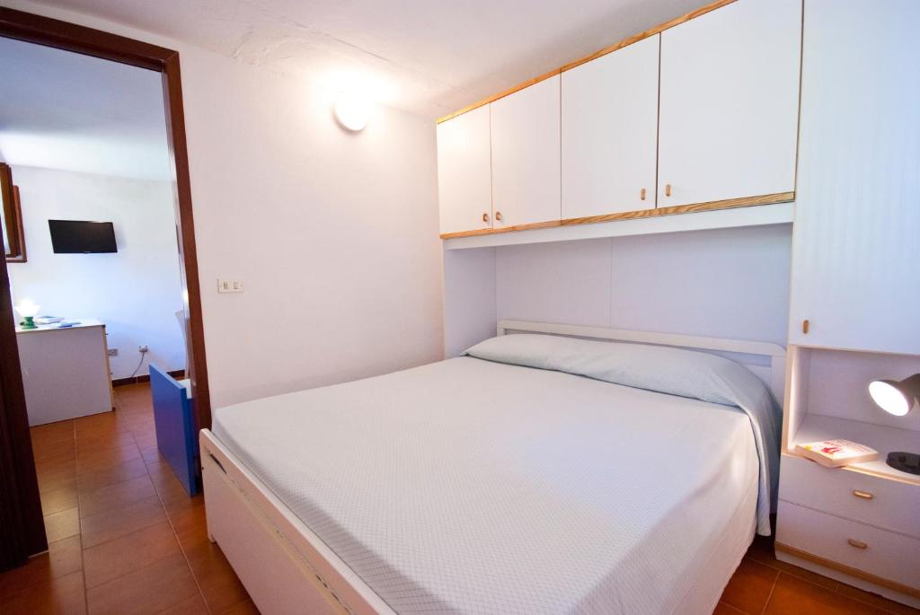 Posteľ alebo postele v izbe v ubytovaní Casa Del Golfo