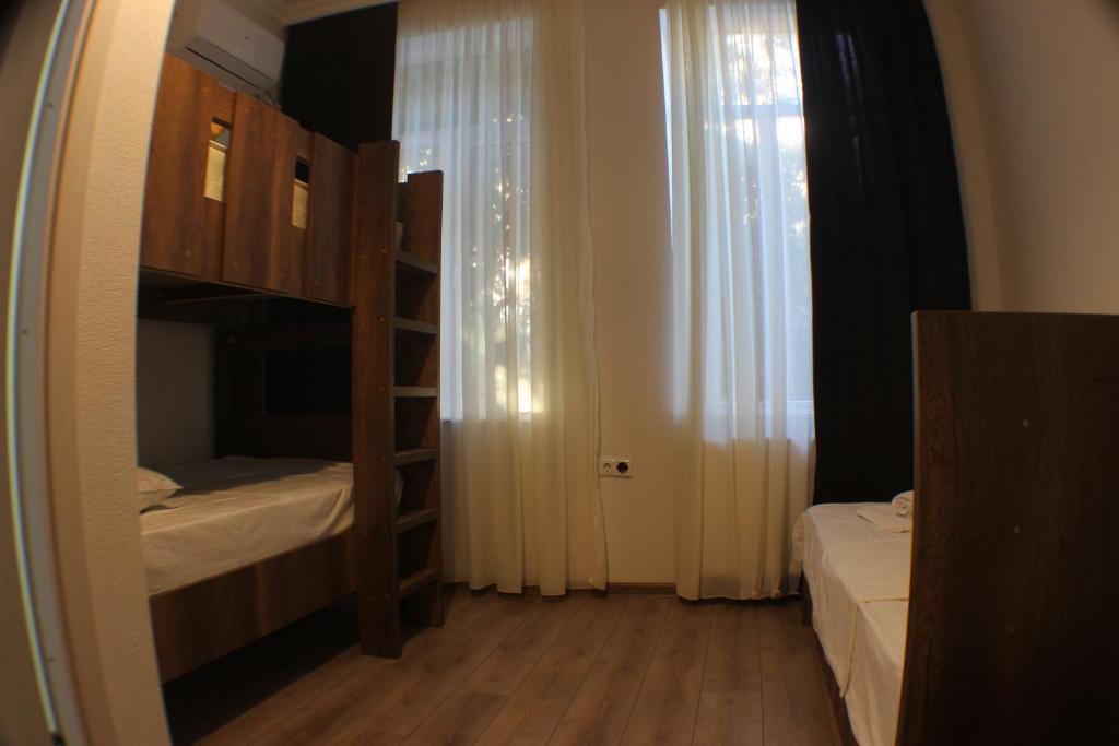 Postel nebo postele na pokoji v ubytování Chveni Qalaqi