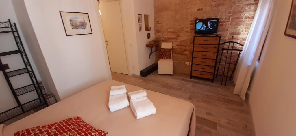Posteľ alebo postele v izbe v ubytovaní ISEPO APARTMENT