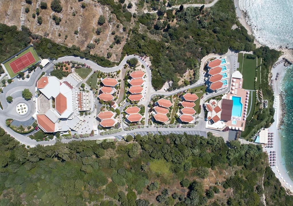 an aerial view of a resort next to the water at Proteas Blu Resort in Pythagoreio