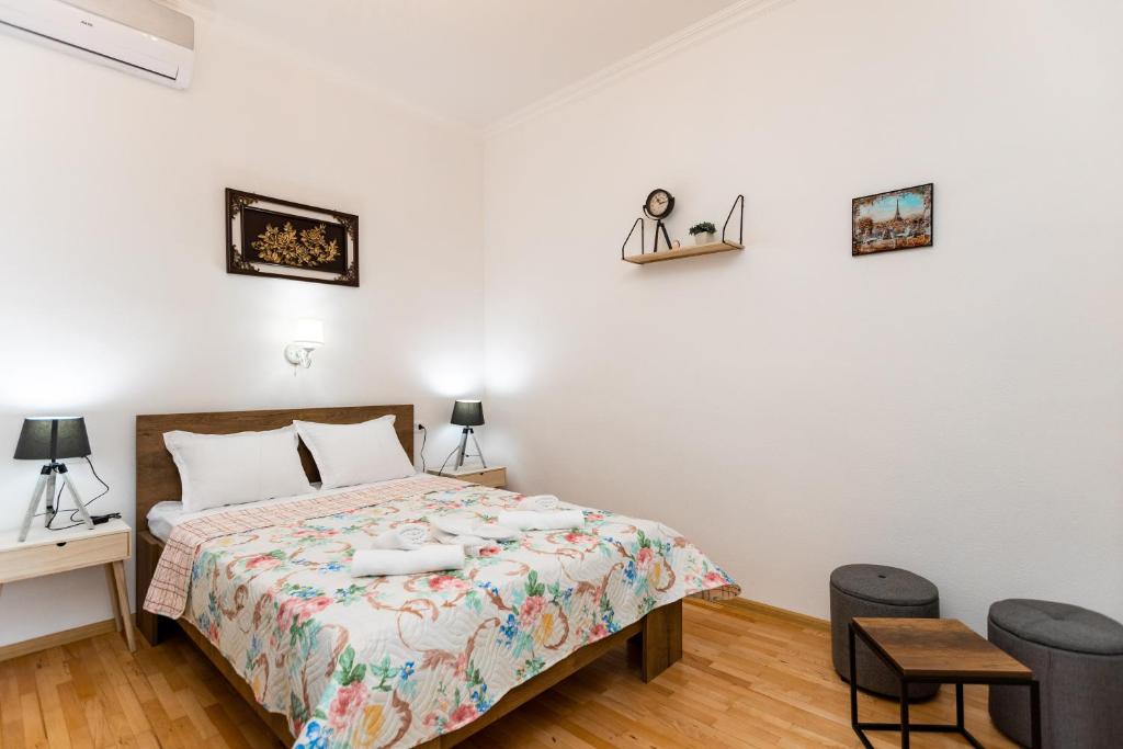 Postel nebo postele na pokoji v ubytování Guest House Nana
