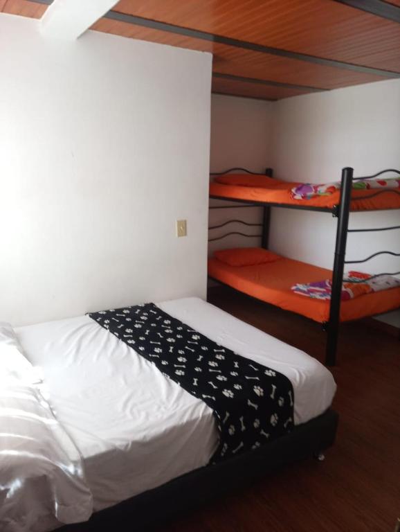Postel nebo postele na pokoji v ubytování Casa hotel Sports and Family