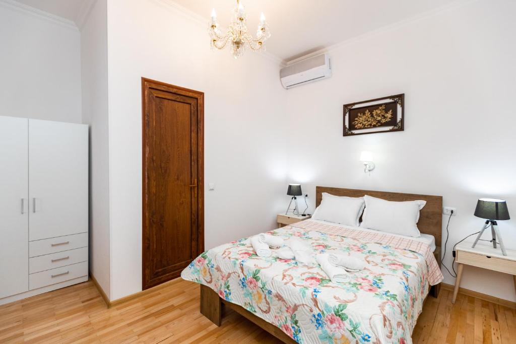 Postel nebo postele na pokoji v ubytování Guest House Nana