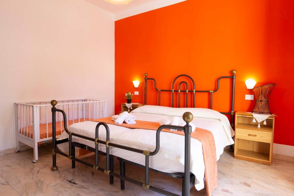Posteľ alebo postele v izbe v ubytovaní Casa Cavour sul Mare