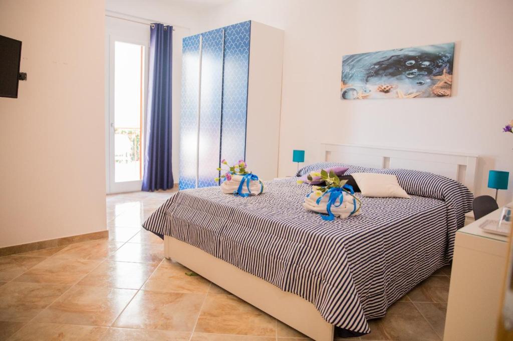 Postel nebo postele na pokoji v ubytování Stella di Mare - Via Amendola