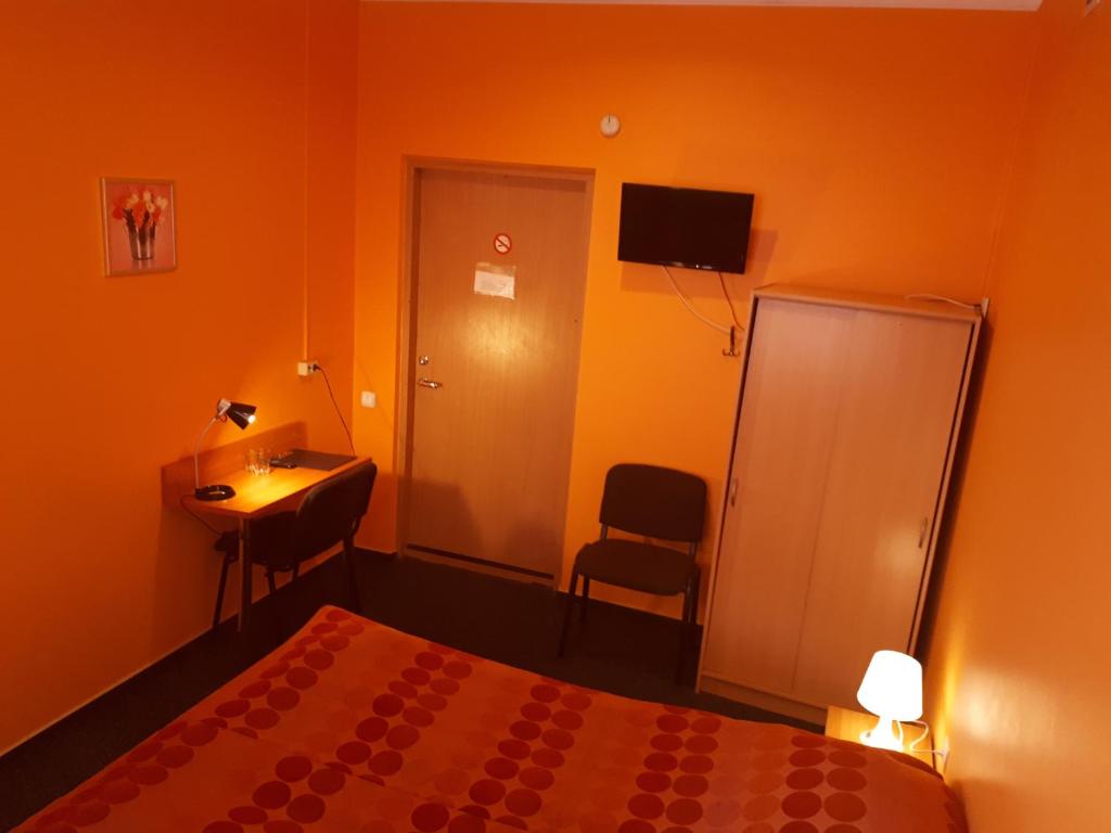 Postel nebo postele na pokoji v ubytování Jeruzale Hotel