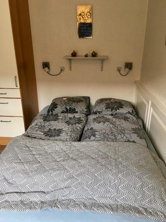 Postel nebo postele na pokoji v ubytování Oasen